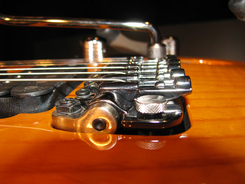 Side view of a SynchroniZR bridge (on an Ibanez SV5470A-HNG) showing pivot position
